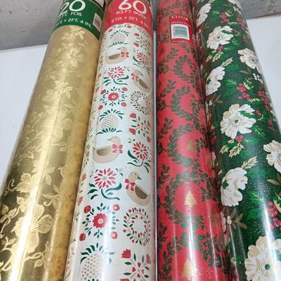 Three large rolls and one smaller roll of Vintage wrapping paper