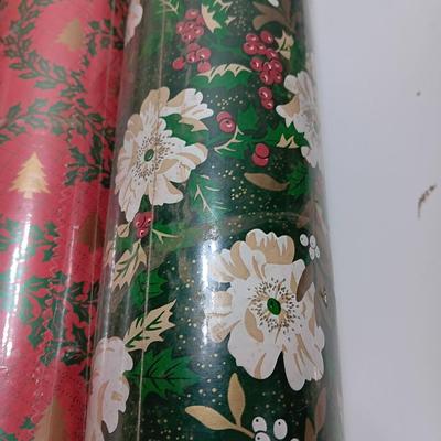 Three large rolls and one smaller roll of Vintage wrapping paper
