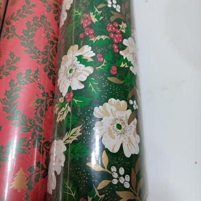 Three large rolls and one smaller roll of Vintage wrapping paper