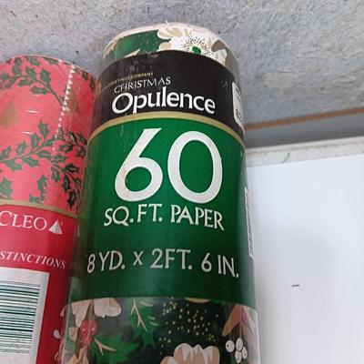 Three large rolls and one smaller roll of Vintage wrapping paper