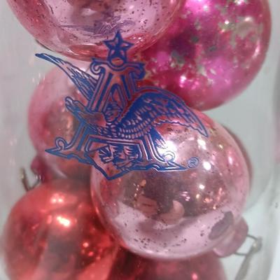 Three wine glasses with vintage glass ornaments
