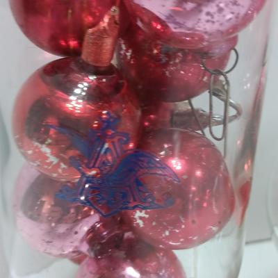 Three wine glasses with vintage glass ornaments