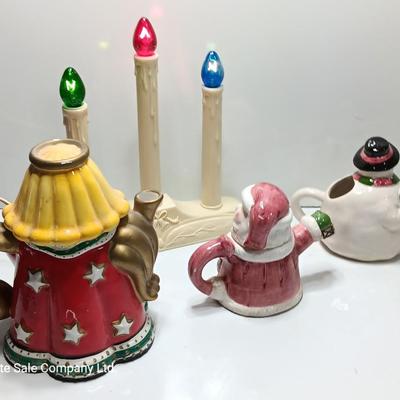 Collection of three tea pots and a working candelabra Christmas candle