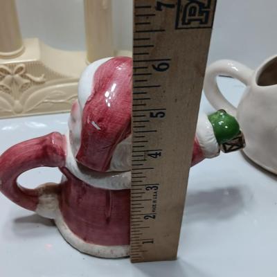 Collection of three tea pots and a working candelabra Christmas candle