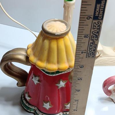 Collection of three tea pots and a working candelabra Christmas candle