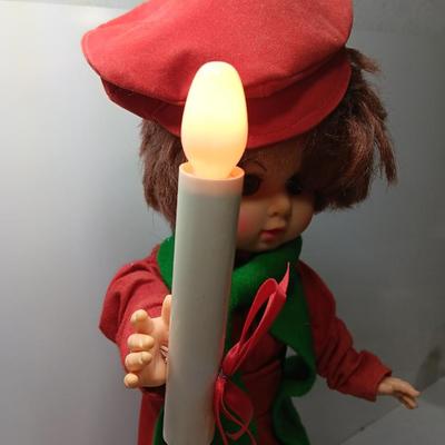 Christmas boy with light up candle