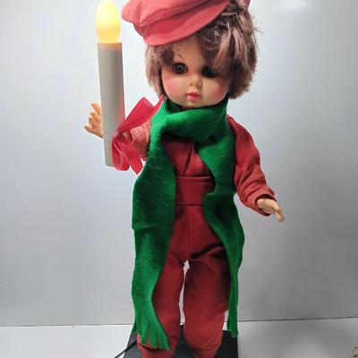 Christmas boy with light up candle