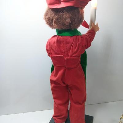 Christmas boy with light up candle