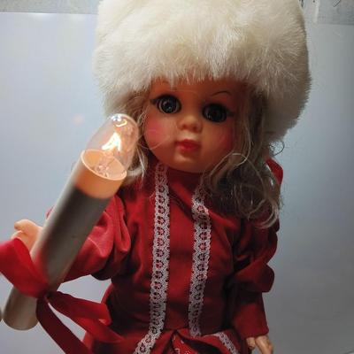 Animated Christmas girl with light up candle