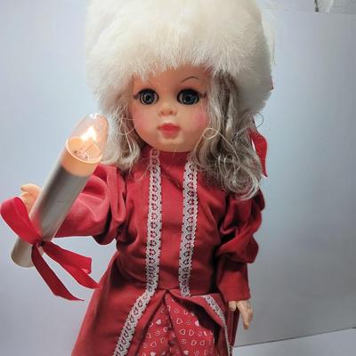 Animated Christmas girl with light up candle