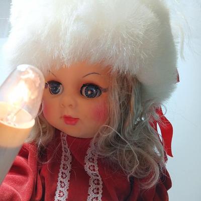 Animated Christmas girl with light up candle