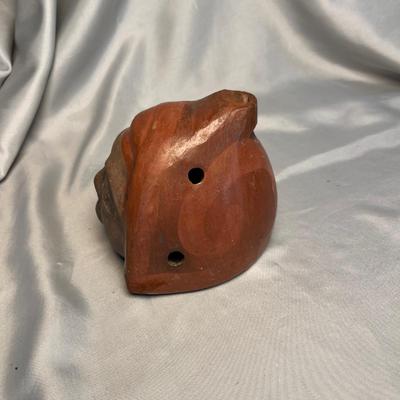 Pottery face sculpture