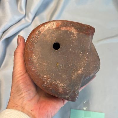 Pottery face sculpture