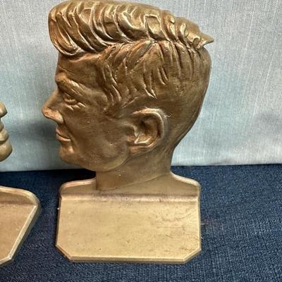 Lot 74 John Kennedy and Robert Kennedy metal book ends approximately 7 1/2 inches tall