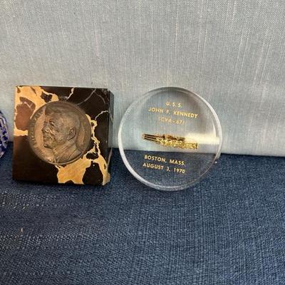 Lot 82  Kennedy paperweights, two glass, one acrylic one marble