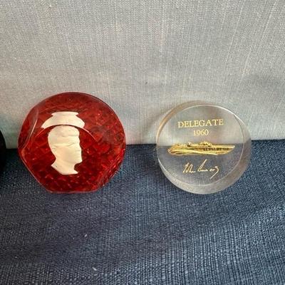 Lot 81 Kennedy paperweights, three glass, one acrylic