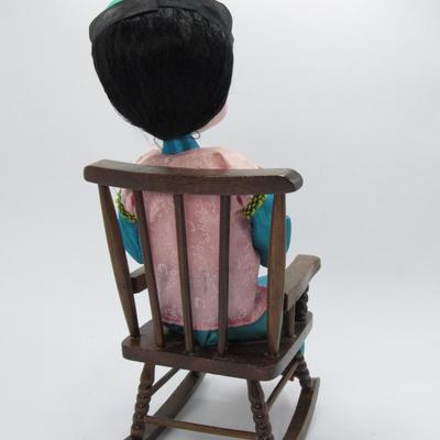 Chinese Doll in Rocking Chair