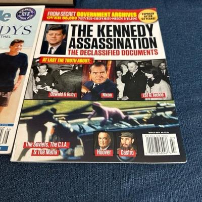 Lot 108  Framed photograph of John F Kennedy Jr. and Jacqueline Kennedy. Also several magazines.