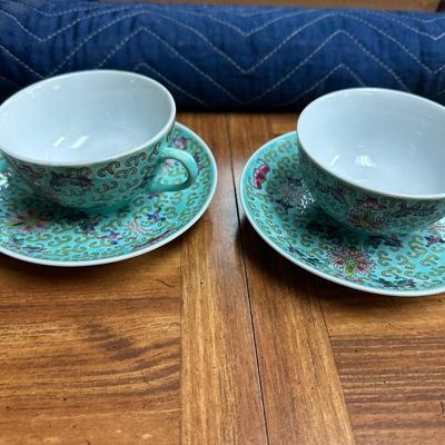 Pair of Chinese turquoise tea cups and saucers