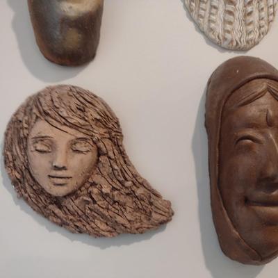Set of Four Pottery Clay Face Portraits Wall Art