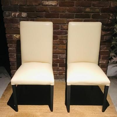 A PAIR OF BEIGE HIGHBACKS..