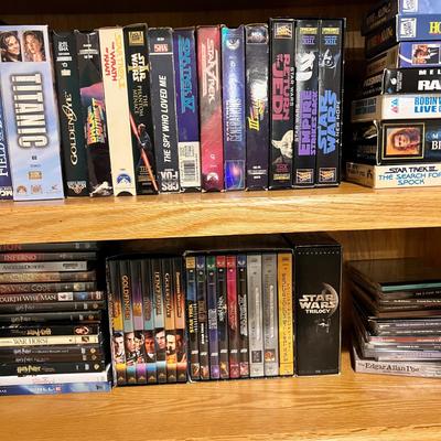 Big Lot of DVDs, VHS Tapes, CDs with Cabinet