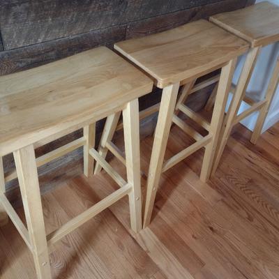 Set of Three Solid Wood Saddle Seat Bar Stools