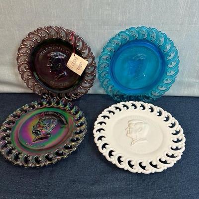 Lot 119  collection of four John F Kennedy, 9 inch L. E. Smith glass company plates.