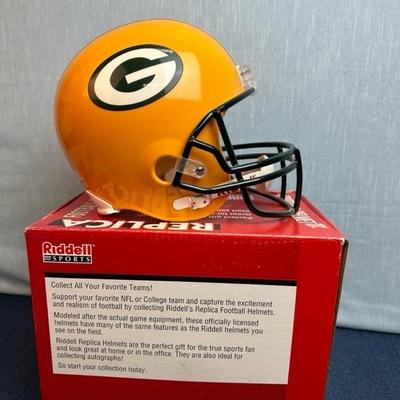Lot 135 Full-size Green Bay Packers replica football helmet by Riddell sports
