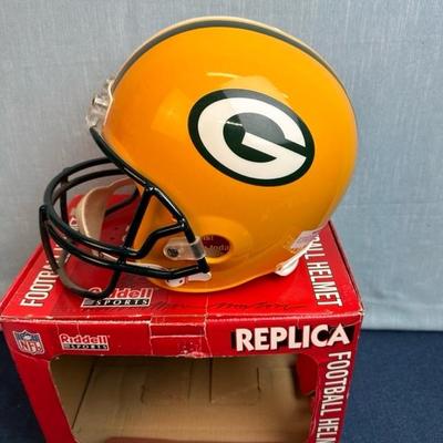 Lot 135 Full-size Green Bay Packers replica football helmet by Riddell sports