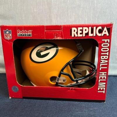 Lot 135 Full-size Green Bay Packers replica football helmet by Riddell sports