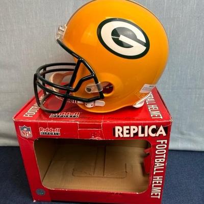 Lot 135 Full-size Green Bay Packers replica football helmet by Riddell sports