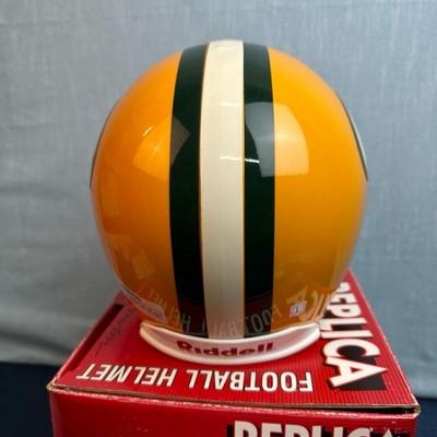 Lot 135 Full-size Green Bay Packers replica football helmet by Riddell sports
