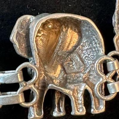Lot 146, Sterling silver, wild animal bracelet