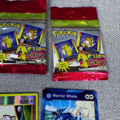 PokÃ©mon Card Packages and some Loose Cards