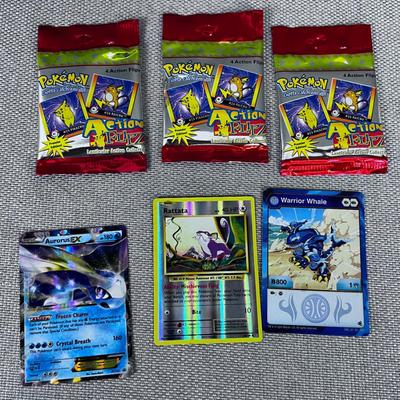 PokÃ©mon Card Packages and some Loose Cards