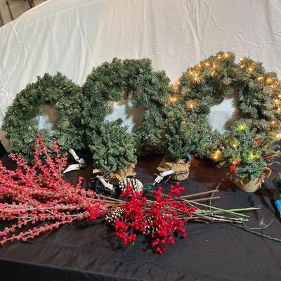 2- Three lighted wreaths, mini trees & red sprigs