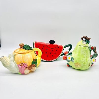 11 TEAPOTS