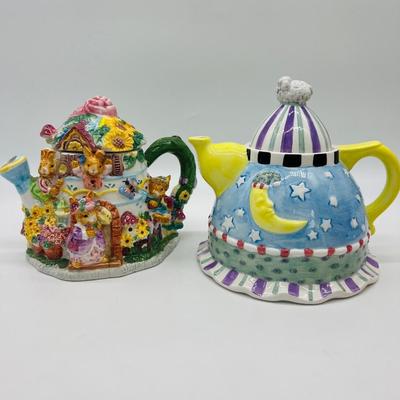 11 TEAPOTS