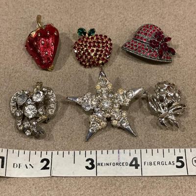 3 red & 3 silver brooches
