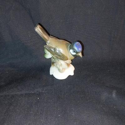 SIGNED FRAMED OIL PAINTING AND COLLECTIBLE PORCELAIN BIRD