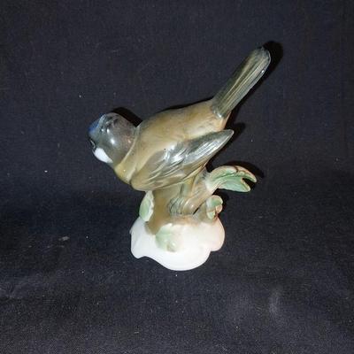 SIGNED FRAMED OIL PAINTING AND COLLECTIBLE PORCELAIN BIRD