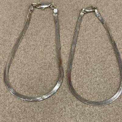2 silver herringbone bracelets