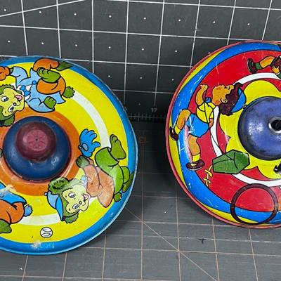 2 Small Tin Litho Tops - 1 is marked Made in the USA 