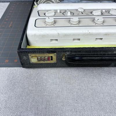 Tens Pain Relief Machine in CASE, comes in a Black Alligator Skin Faux Case. 