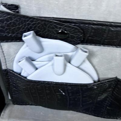 Tens Pain Relief Machine in CASE, comes in a Black Alligator Skin Faux Case. 