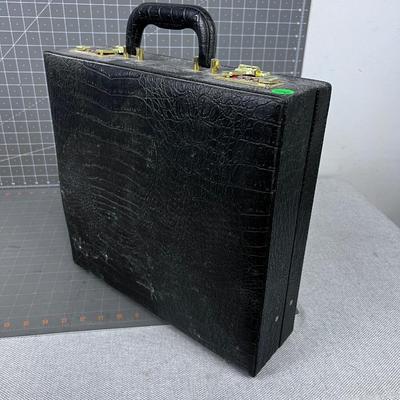 Tens Pain Relief Machine in CASE, comes in a Black Alligator Skin Faux Case. 