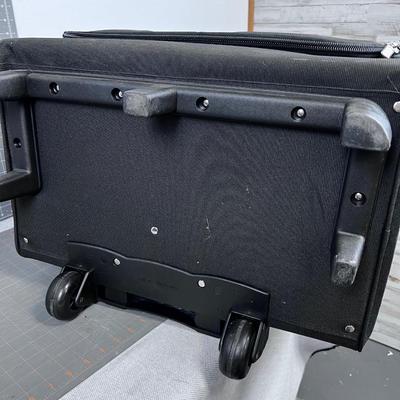 Bernina Sewing Machine and Accessory Case - Rolling and has a Handle.