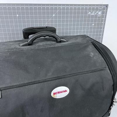 Bernina Sewing Machine and Accessory Case - Rolling and has a Handle.