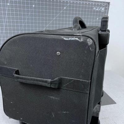 Bernina Sewing Machine and Accessory Case - Rolling and has a Handle.